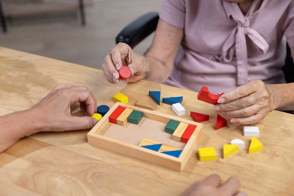 Photo of a senior working on the puzzle